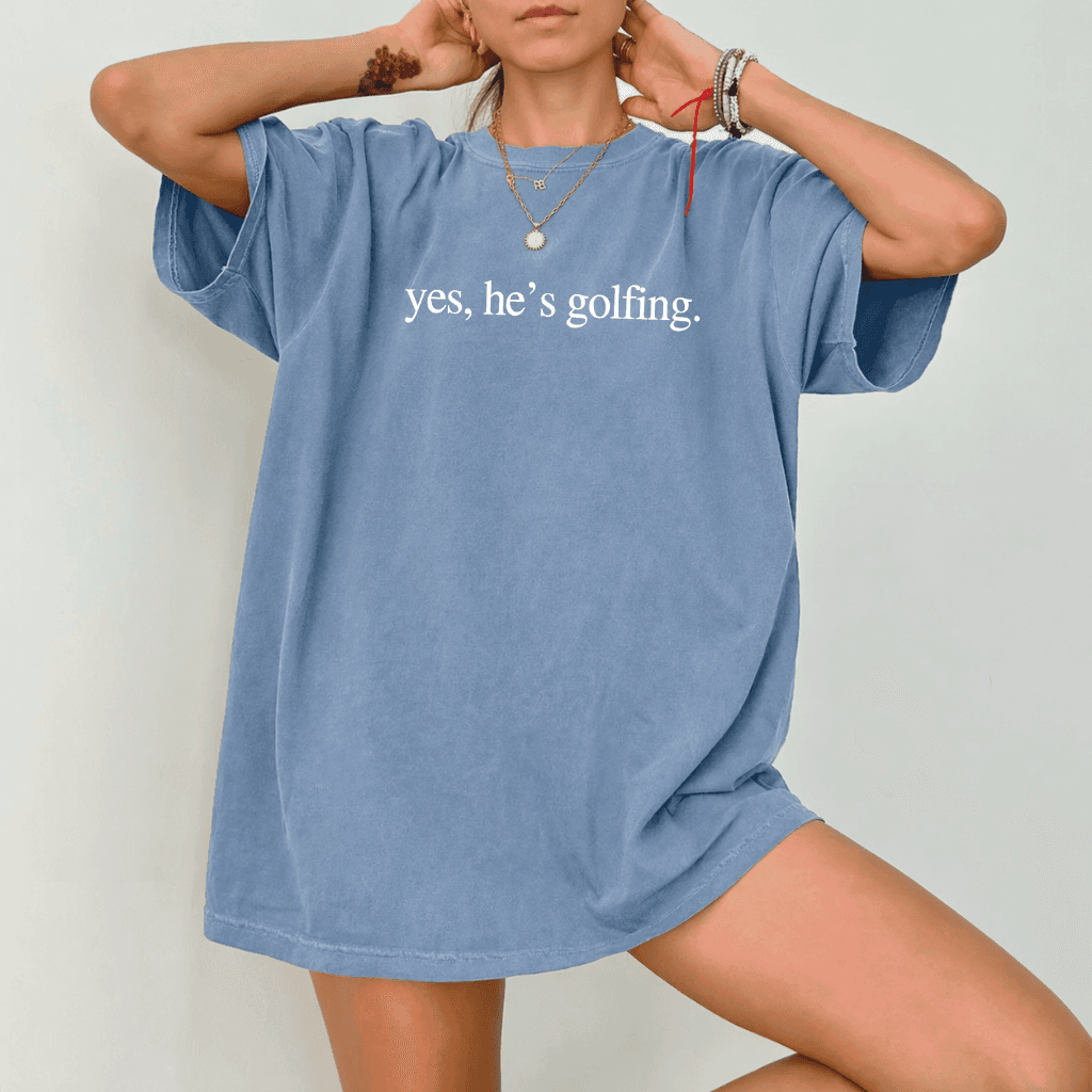He's Golfing Comfort Colors T-Shirt - Funny Gift for Golfer Wife, Golf Season thumbnail - back view
