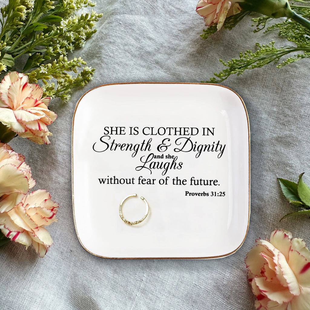 She is clothed in Strength Inspirational Gifts for Women Ceramic Ring Dish Birthday Gifts for Women Unique, Best Friends Gifts For Women Her Mom Sister Coworker