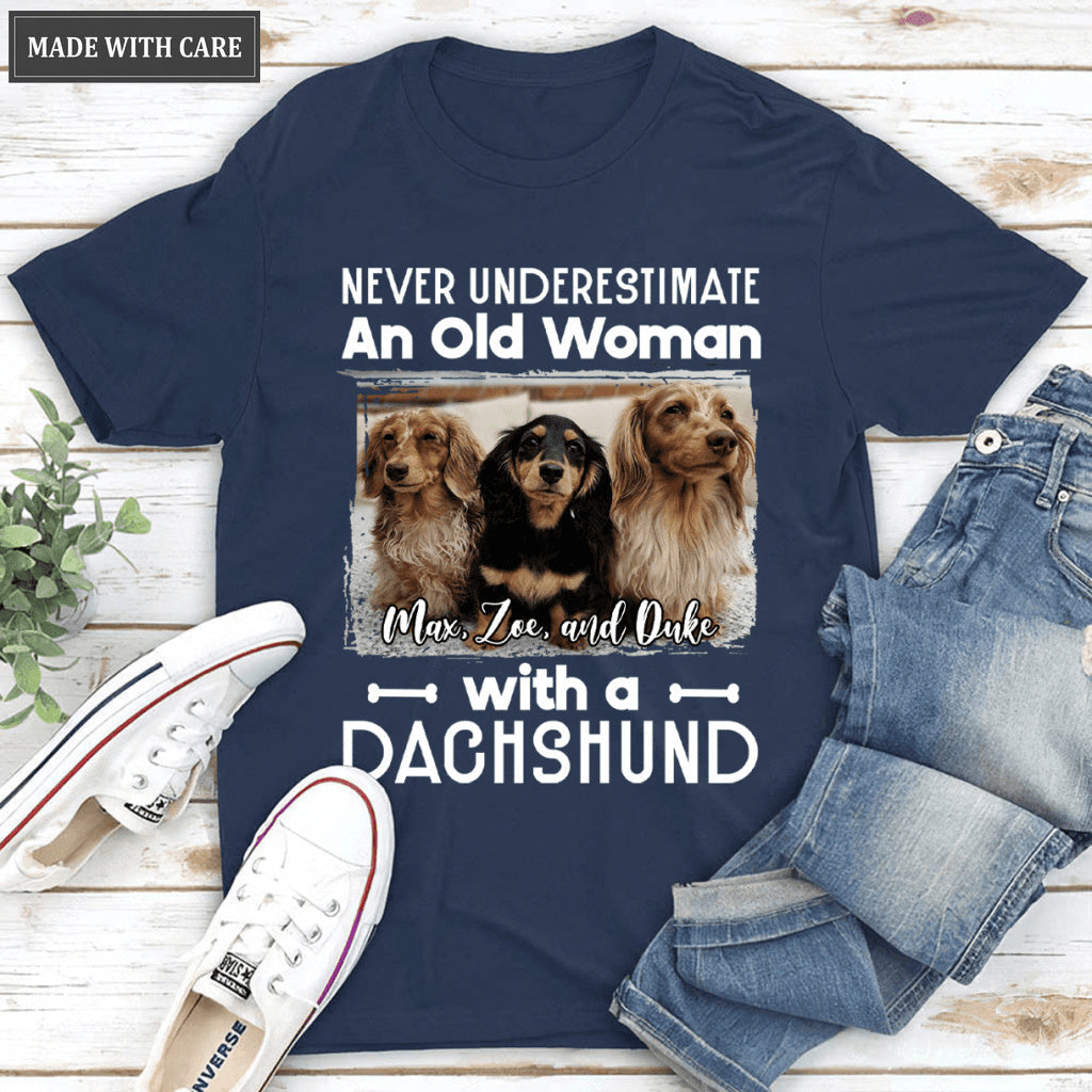 Never underestimate an old woman with A dachshund - Personalized Custom Unisex T-Shirt