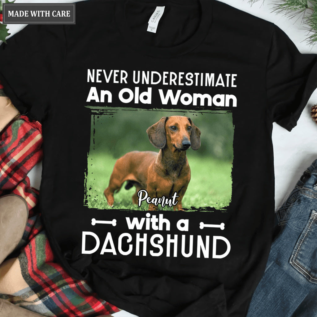 Never underestimate an old woman with A dachshund - Personalized Custom Unisex T-Shirt